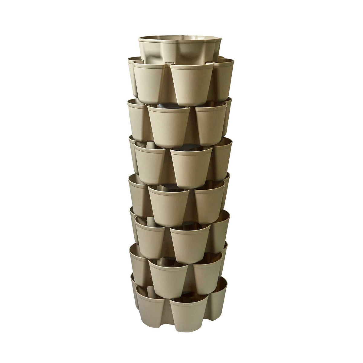 Empty GreenStalk 7-tier vertical planter in stone beige, its tall stacked column of overlapping pots angled outward on each level for planting, shown against a plain white background.