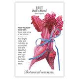Botanical Interests seed packet for Bull's Blood Beet, illustrated with a bundle of deep red beetroots and crinkled crimson leaves tied with blue ribbon, with printed text noting frost tolerance, a 50-60 day harvest, and sowing instructions.