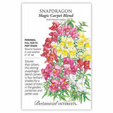 Seed packet for Magic Carpet Blend Snapdragon featuring an illustration of tall spikes of red, pink, yellow, and white snapdragon blooms, with text noting it's a perennial for full sun to part shade, growing 6-8 inches tall and blooming heaviest in cool weather.
