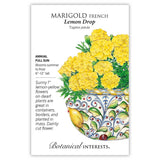 Seed packet for Lemon Drop French Marigold showing an illustration of double, lemon-yellow ruffled blooms with feathery green foliage in a decorative blue and yellow patterned bowl, with text noting it's an annual for full sun, blooming summer to frost at 6