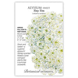Seed packet for Sweet Alyssum 'Tiny Tim' featuring an illustration of a dense cluster of tiny white flowers with yellow-green centers, alongside printed text noting it's an annual for full sun to part shade, blooming spring to frost, growing 2-4 inches tall and 6-12 inches wide, with a description praising its honey-scented, compact, snowdrift-like blooms.