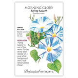 Seed packet for Flying Saucer Morning Glory illustrating trumpet-shaped flowers with sky-blue stripes radiating on a white background and lemon-yellow throats, heart-shaped leaves and buds trailing on a vine, with text noting it's an heirloom annual for full sun that blooms summer to frost on a 10-foot vine.