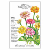 Botanical Interests seed packet for Peppermint Stick Zinnia, illustrated with speckled and streaked pink, yellow, and orange blooms on tall green stems, with text noting it's a full-sun annual growing 24–36 inches tall that blooms summer to frost and makes good cut flowers.
