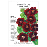 Botanical Interests seed packet for Black Velvet Nasturtium, illustrated with deep ruby-red blossoms against round green leaves, plus printed text noting it's a full sun to part shade annual growing 10–12 inches tall and blooming late spring to frost.