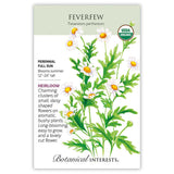 Front of an organic Botanical Interests seed packet for Feverfew Seeds featuring a USDA Organic seal and botanical information and illustrations of small white, daisy-like flowers with yellow centers and green leaves.