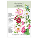 Seed packet for Outhouse Hollyhock featuring a botanical illustration of tall stems with large single blooms in pink, white, and dark magenta, with USDA Organic seal and text noting it's a biennial, full-sun plant blooming summer at 6-9 feet tall, good for cottage gardens and vases.