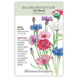 Front of an organic Botanical Interests seed packet for Tall Blend Bachelor's Button Seeds displaying a USDA Organic seal, heirloom description, and a botanical illustration of colorful pink, purple, and blue bachelor's button flowers.