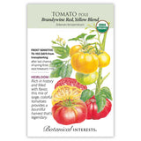 Seed packet for Botanical Interests organic heirloom Brandywine Red and Yellow Blend pole tomato, illustrated with clustered yellow tomatoes on the vine and large red and yellow beefsteak fruits, one sliced open, alongside text noting frost sensitivity, 76–100 days to harvest, and indeterminate growth habit.