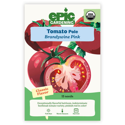 An Epic Gardening USDA Organic Brandywine Pink Pole Tomato seed packet featuring an illustration of pinkish-red tomatoes with one sliced open, a "Classic Flavor" callout, and 15 seeds count on a plain white background.
