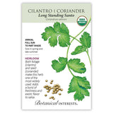 Seed packet for Long Standing Santo cilantro/coriander, USDA Organic and heirloom, illustrated with a detailed leafy green stem and a scattering of tan round coriander seeds, alongside text noting it's an annual for full sun to part shade, sown in spring and late summer.
