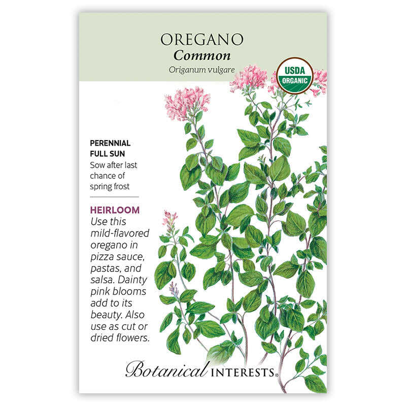 Seed packet for Common Oregano featuring a botanical illustration of leafy stems with small pink flower clusters, plus a USDA Organic seal and printed text noting it's an heirloom perennial for full sun, sown after last frost, described as mild-flavored for pizza sauce, pastas, salsa, and dried arrangements.