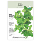 Seed packet for Organic Lemon Basil featuring a detailed illustration of bright green, veined leaves on branching stems, with printed text noting it's a full sun to part shade annual with compact bush growth and lemony aroma.