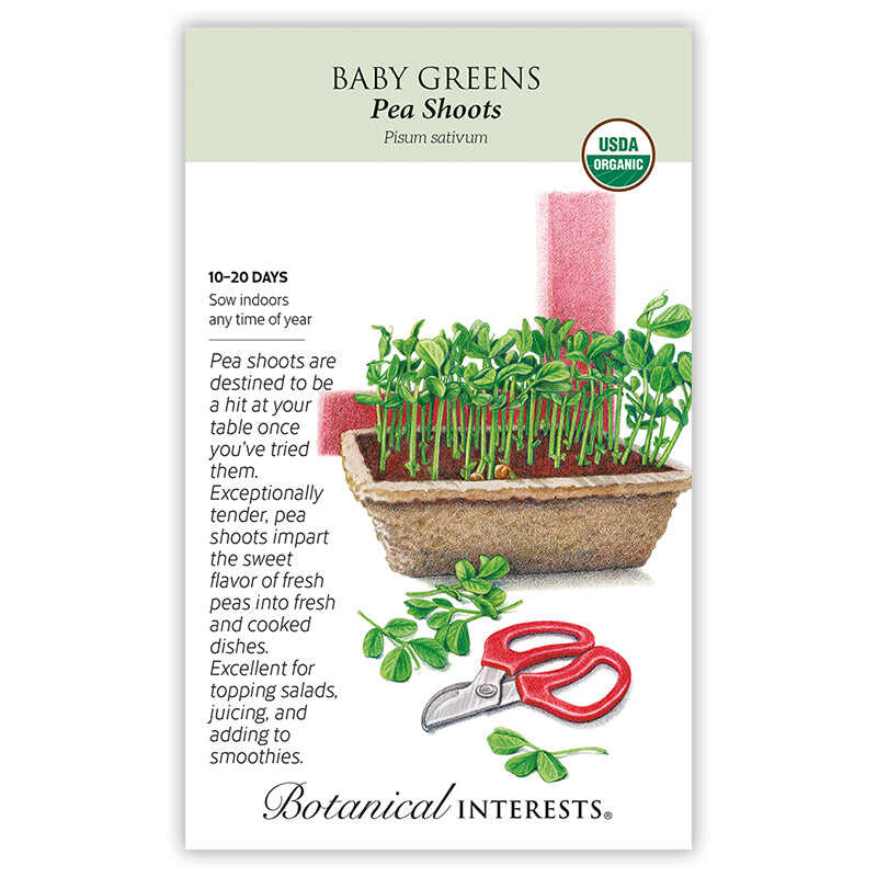 Seed packet for USDA Organic Pea Shoots baby greens, illustrated with a tray of green pea shoots growing in soil beside red-handled scissors and a cut sprig, with text noting a 10–20 day sowing time and describing the tender, sweet flavor for salads, juicing, and smoothies.