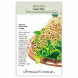 Seed packet for USDA Organic Salad Mix Sprouts, illustrated with tangled pale sprout tendrils topped with green kale and broccoli leaves and burgundy amaranth over a wooden bowl, with text noting a 5–7 day growing time and describing the alfalfa, clover, broccoli, kale and amaranth blend.