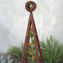 Zinc metal A-frame Bird Cafe with Trellis topped with a circular oxide steel bird feeder, featuring orange flowers climbing the trellis