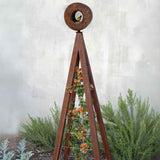 Zinc metal A-frame Bird Cafe with Trellis topped with a circular oxide steel bird feeder, featuring orange flowers climbing the trellis
