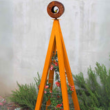 Orange metal A-frame Bird Cafe with Trellis topped with a circular oxide steel bird feeder, featuring orange flowers climbing the trellis