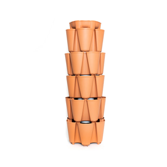 Terracotta-coloured GreenStalk 5-tier vertical planter, a tall stacked tower with staggered outward-facing pockets around each level for planting, shown empty against a plain white background.