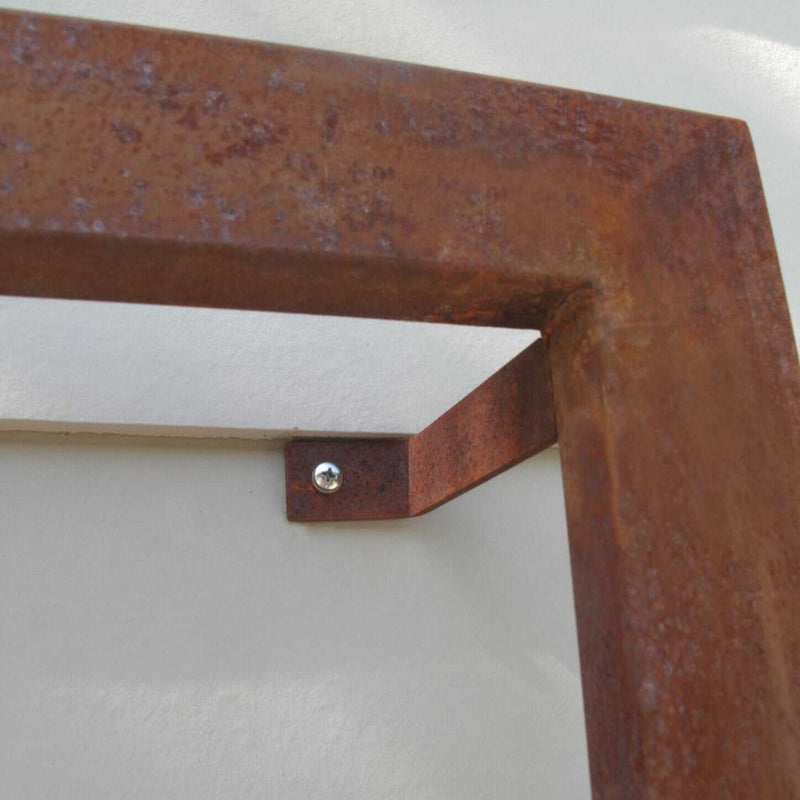Close-up of a rust-finished steel mounting bracket and frame on the Ina Wall Trellis Regular