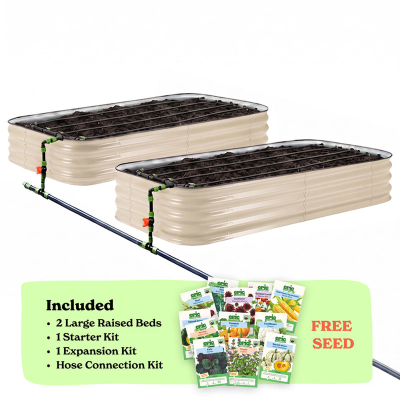 Two light clay corrugated raised garden beds with soil inside, connected by a black hose of the epic irrigation system on a white background. A light green banner at the bottom lists included items: 2 15-inch tall large raised beds, 1 starter kit, 1 expansion kit, and hose connection kit, with a small seed packet collage and the words 'FREE SEED'.