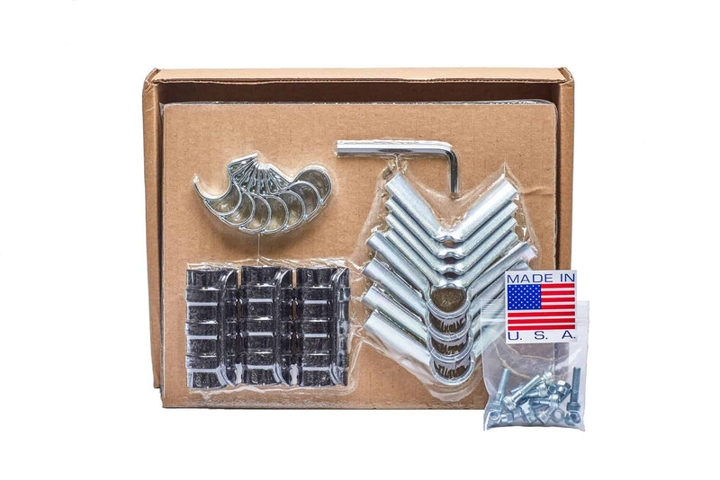 Open cardboard box containing an Epic Cover Frame Kit with metal V-shaped brackets, curved corner clamps, black plastic clips, an Allen wrench, a bagged set of nuts and bolts, and a 