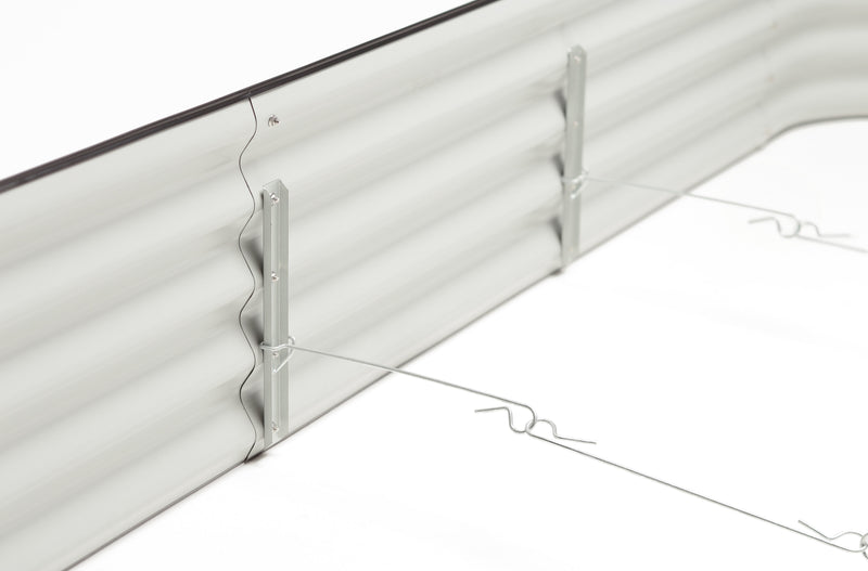 Close-up of a metal raised garden bed hooks connected together set in a white background