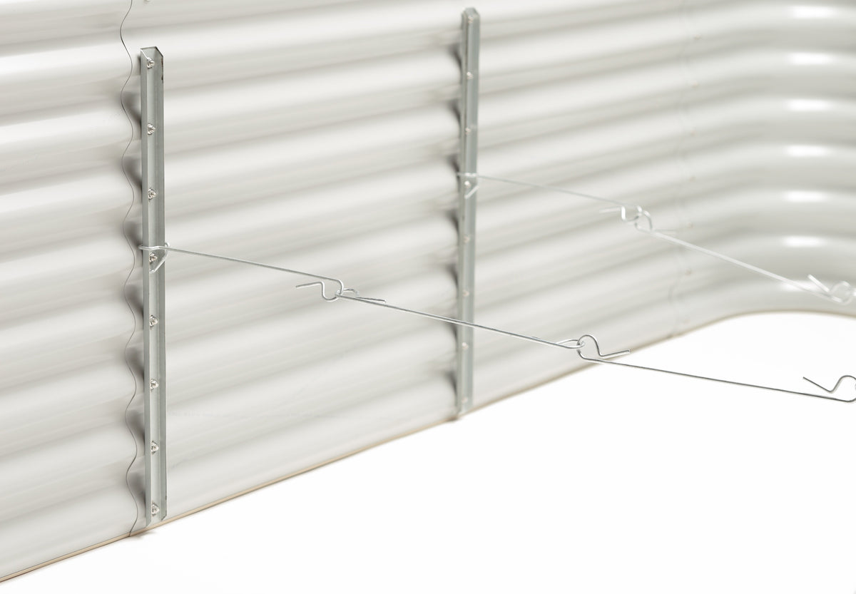 Close-up of a metal raised garden bed hooks connected together set in a white background