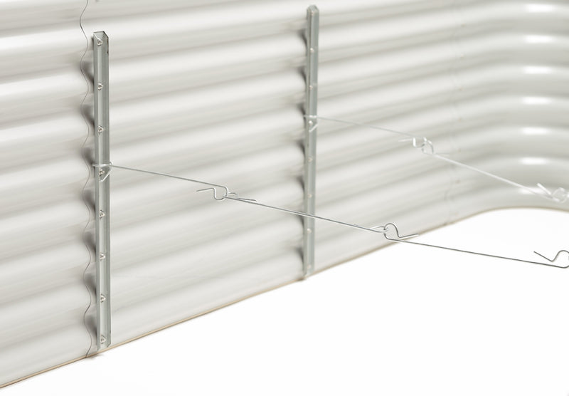 Close-up of a metal raised garden bed hooks connected together set in a white background