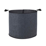 Empty round fabric grow bag in dark grey felt-like material with two black carrying handles and reinforced black stitching along the rim and base, shown against a plain white background.