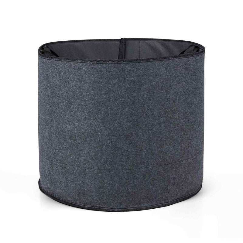 Empty round dark grey fabric grow bag with black stitched rim, shown standing open on a plain white background.