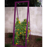 Purple metal frame A-frame Mira Garden Trellis with black-eyed Susan vines climbing up the grid wire, positioned in front of a concrete wall