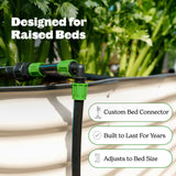 Garden irrigation system with customizable bed connector for raised beds, set against a background of green plants.