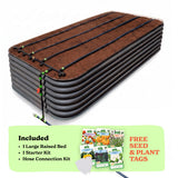 A 29-inch large raised garden bed in slate gray color filled with soil, shown with drip irrigation tubing laid across the top. A light green promotional banner at the bottom lists included items: 1 large raised bed, 1 starter kit, and hose connection kit, with a small image of seed packets and the text 'Free Seed & Plant Tags'.
