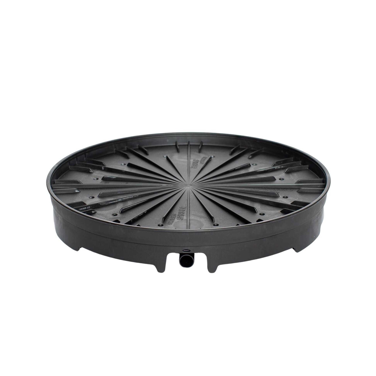 Round black plastic spinning base for a vertical planter, featuring radiating ribbed channels, a raised rim, and a small drainage outlet spout on one side, shown on a plain white background.