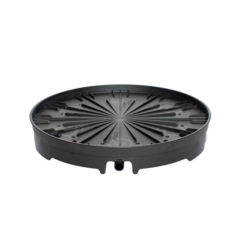 Round black plastic spinning base for a vertical planter, featuring radiating ribbed channels, a raised rim, and a small drainage outlet spout on one side, shown on a plain white background.