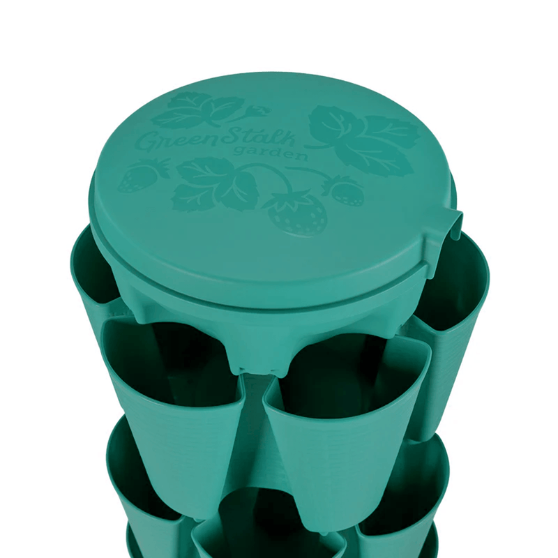 Teal GreenStalk vertical planter water reservoir lid on a white background.