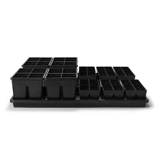 Eye-level front view of black Epic 6-cell and 4-cell seed starting trays arranged inside two black universal bottom trays on a white background.