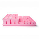 Eye-level front view of bright pink Epic 6-cell and 4-cell seed starting trays arranged inside two matching pink