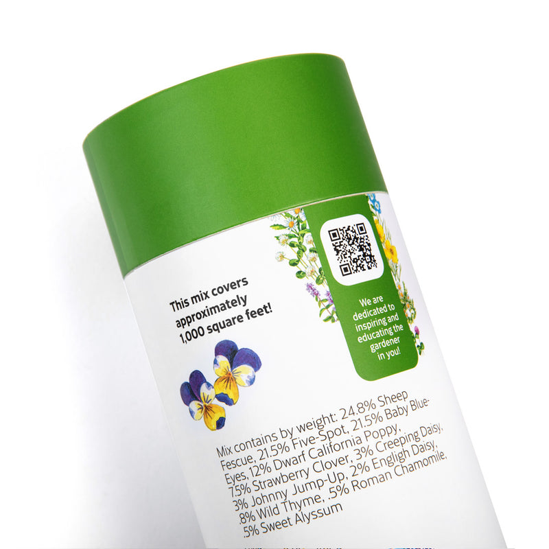 Close-up of the EcoEase Flowering Mix Alternative Lawn Seed Shaker container, featuring a QR code and content label 