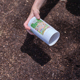 GIF of White Clover Alternative Lawn Seed being spread on the ground