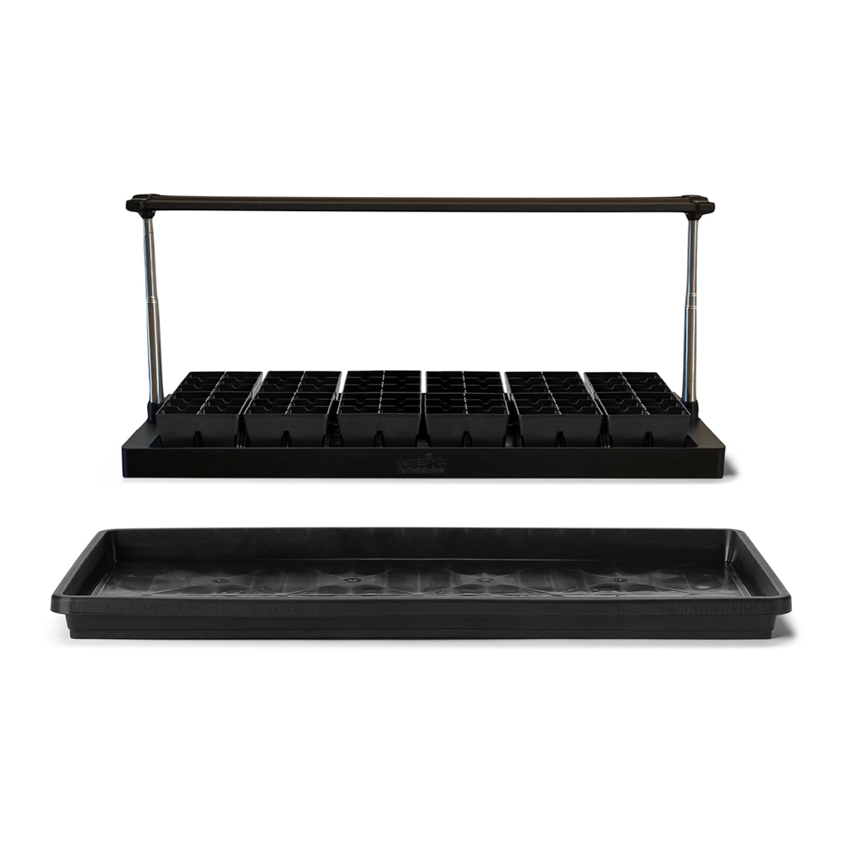 A group of 12 6-cell seed starting trays arranged below the standard epic gardening seed starting grow light. In front is the 1020 epic seed starting tray