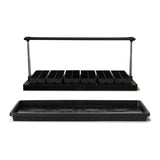 A group of 12 6-cell seed starting trays arranged below the standard epic gardening seed starting grow light. In front is the 1020 epic seed starting tray