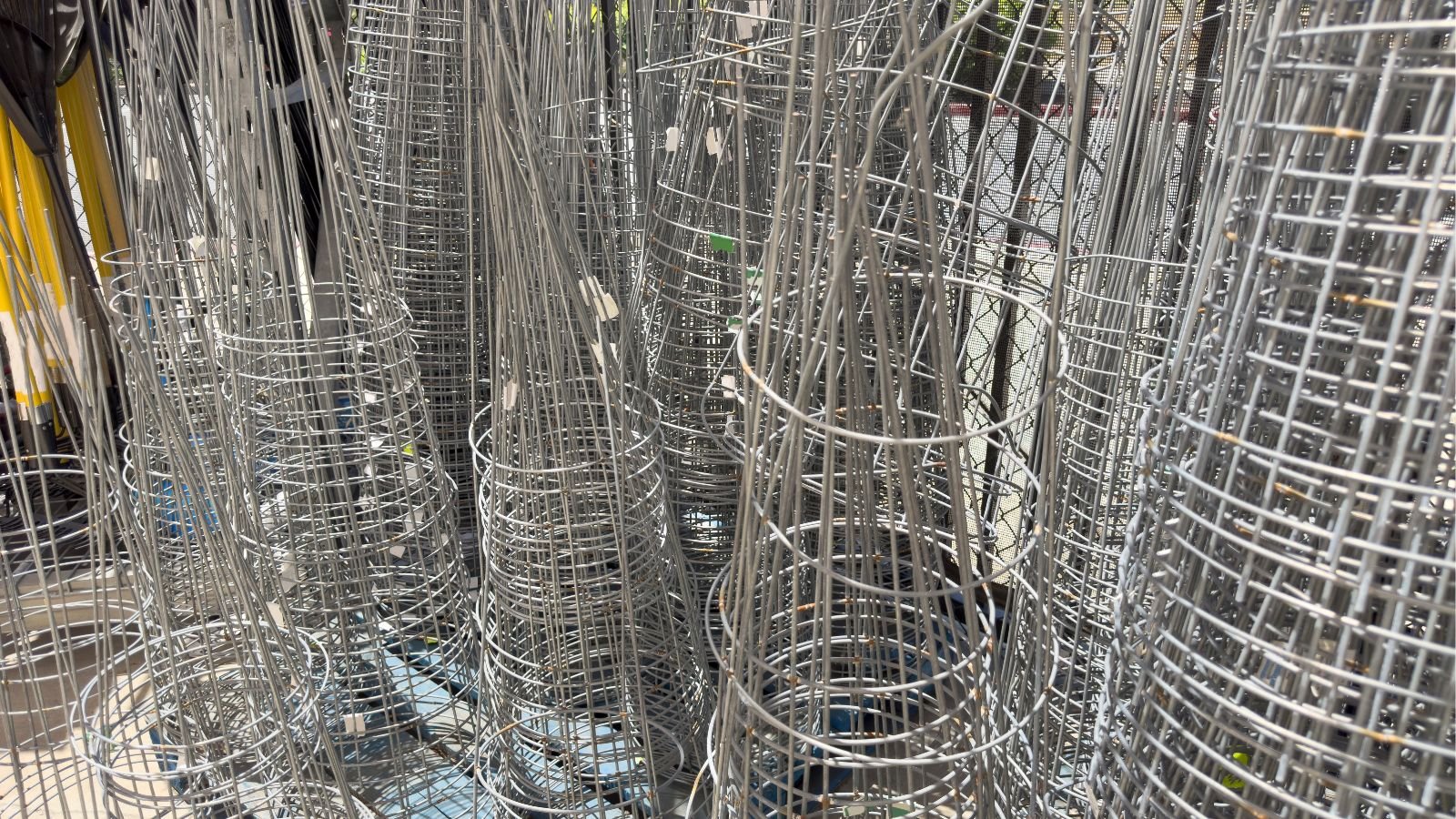 A close-up shot of a a large composition of several tower cage for crops
