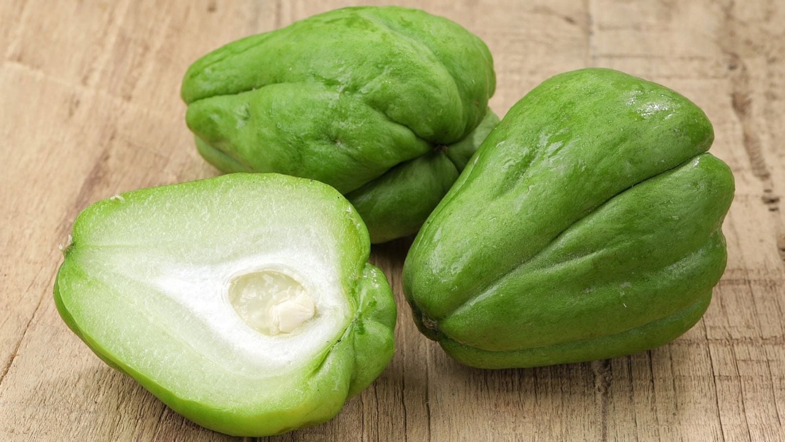 A close-up shot of freshly harvested and sliced chayote crops