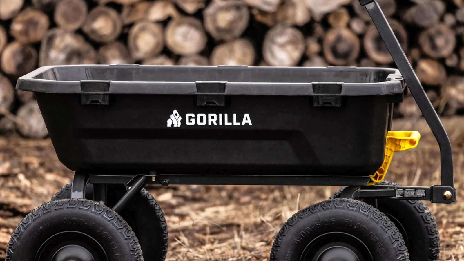 Black garden cart used to transport garden debris easily. 
